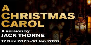 There is a predominently black background. To the right is a slightly faded image of several lit lamps. To the left is text. The larger text is in gold and says 'A CHRISTMAS CAROL'. Beneath that in smaller, white writing: 'A version by JACK THORNE. 12 Nov 2025 - 10 Jan 2026'