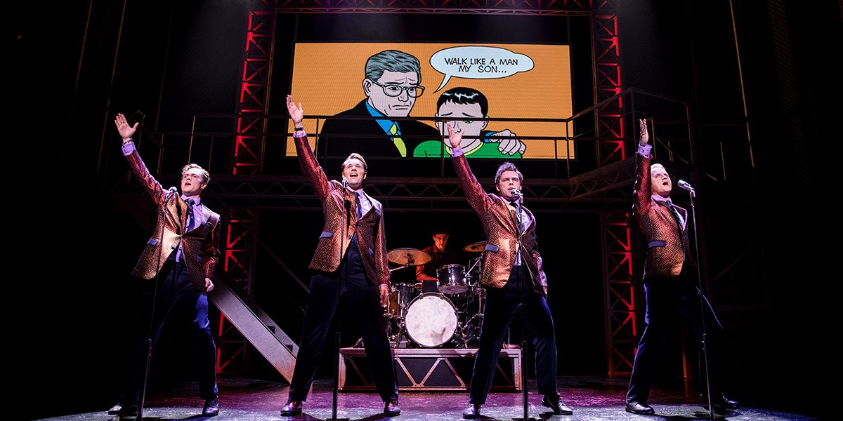 Ben Joyce, Adam Bailey, Benjamin Yates, and Karl James Wilson pose together in costumes from Jersey Boys.