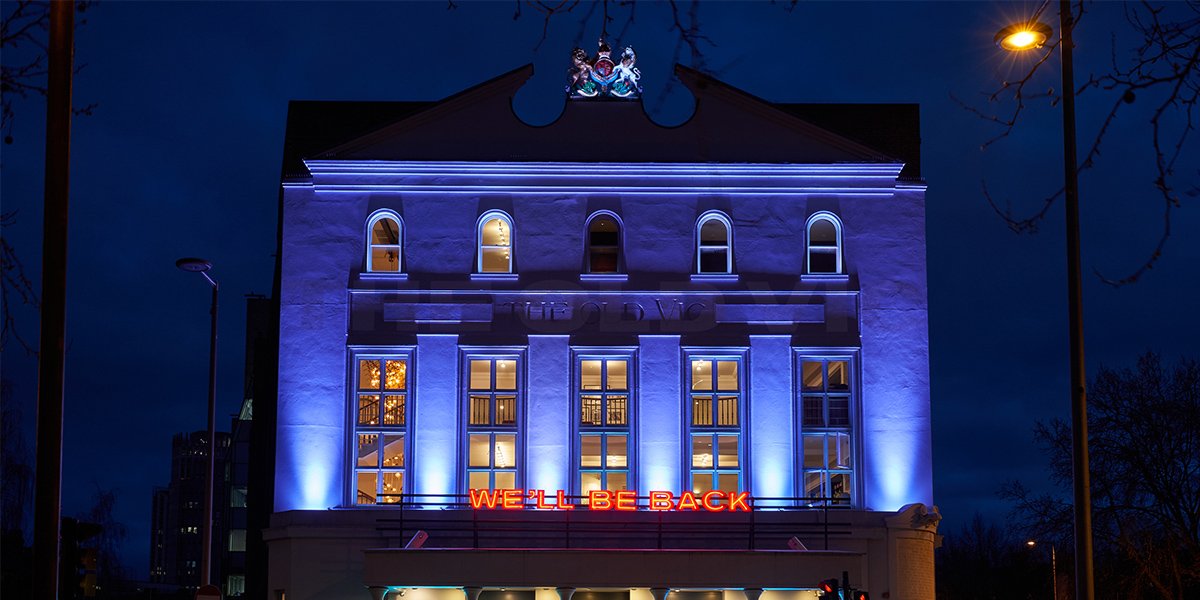 Photo of the Old Vic with the signage reading 'We'll Be Back'